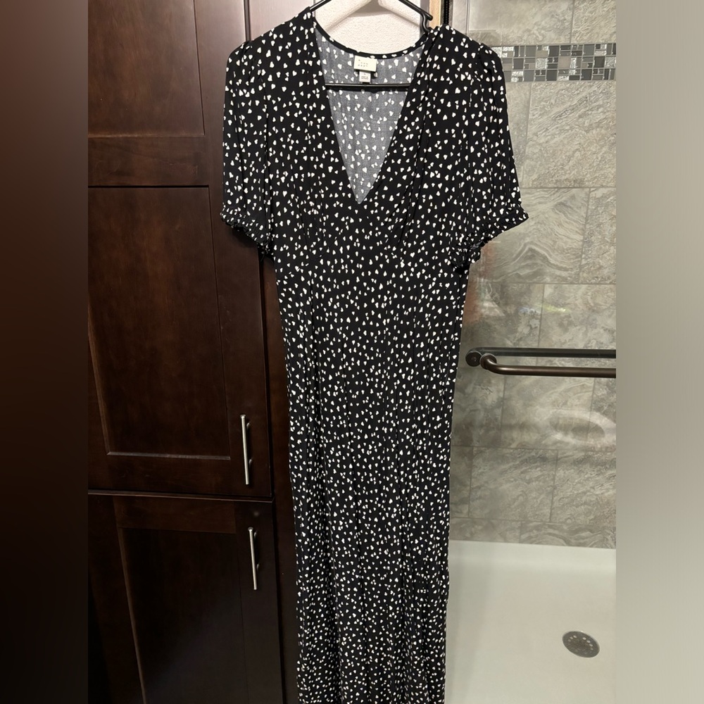 Black fitted maxi dress.